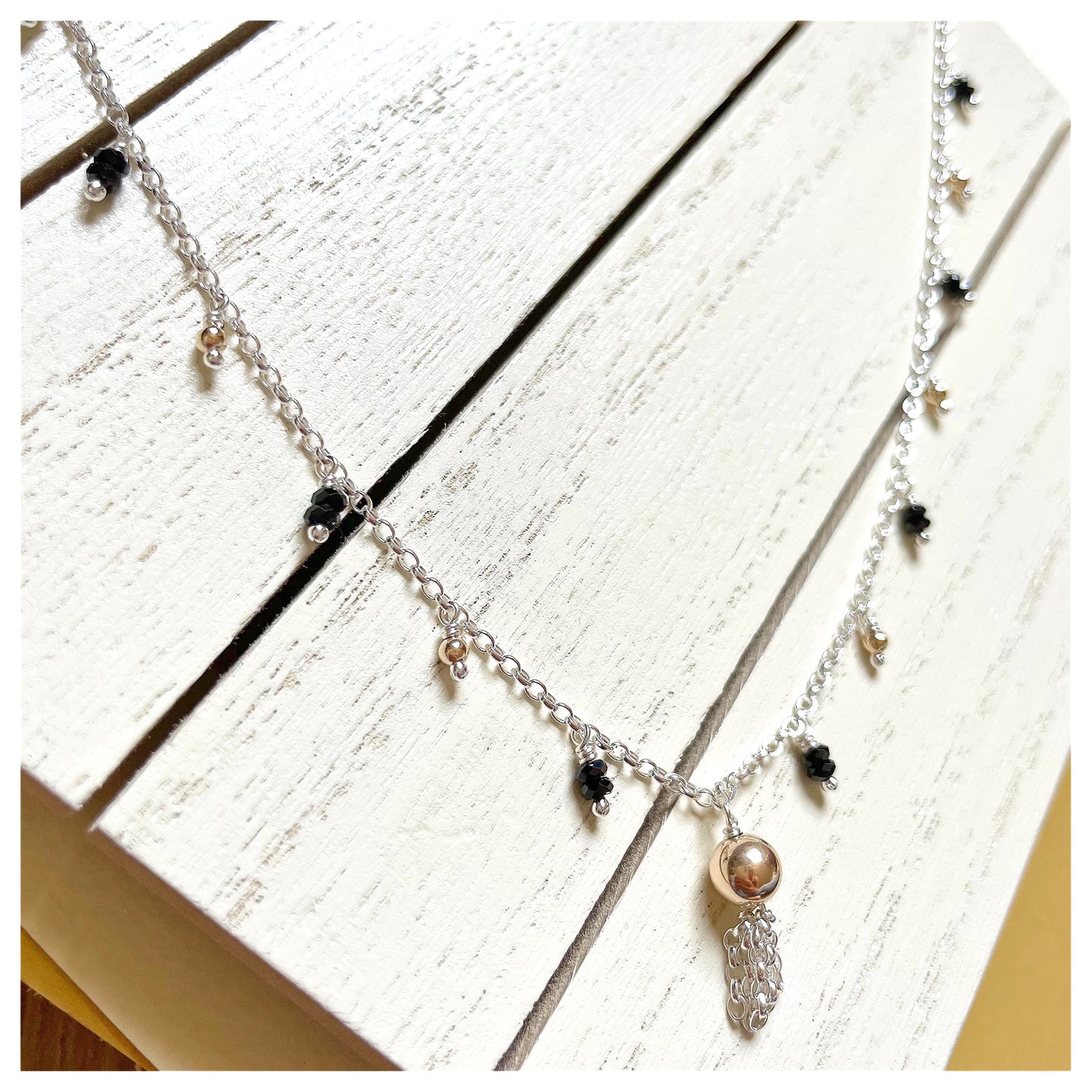 9ct Yellow Gold, Sterling Silver and Black Spinel Beaded Tassel Necklace.