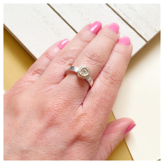 Sterling Silver Mini Hammered Donut Ring With 9ct Yellow Gold Halo.