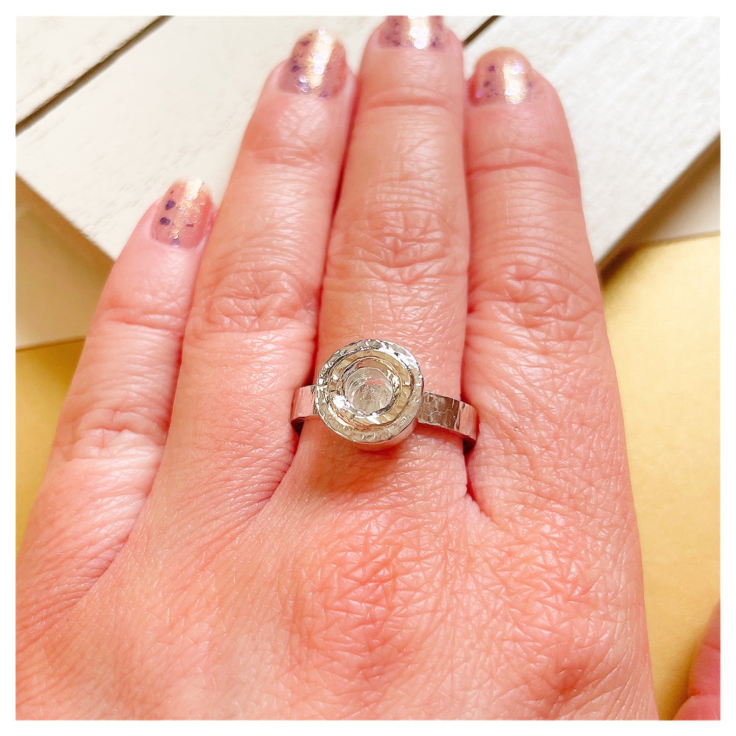 Sterling Silver Hammered Donut Ring With a Hammered 9ct yellow Gold Halo