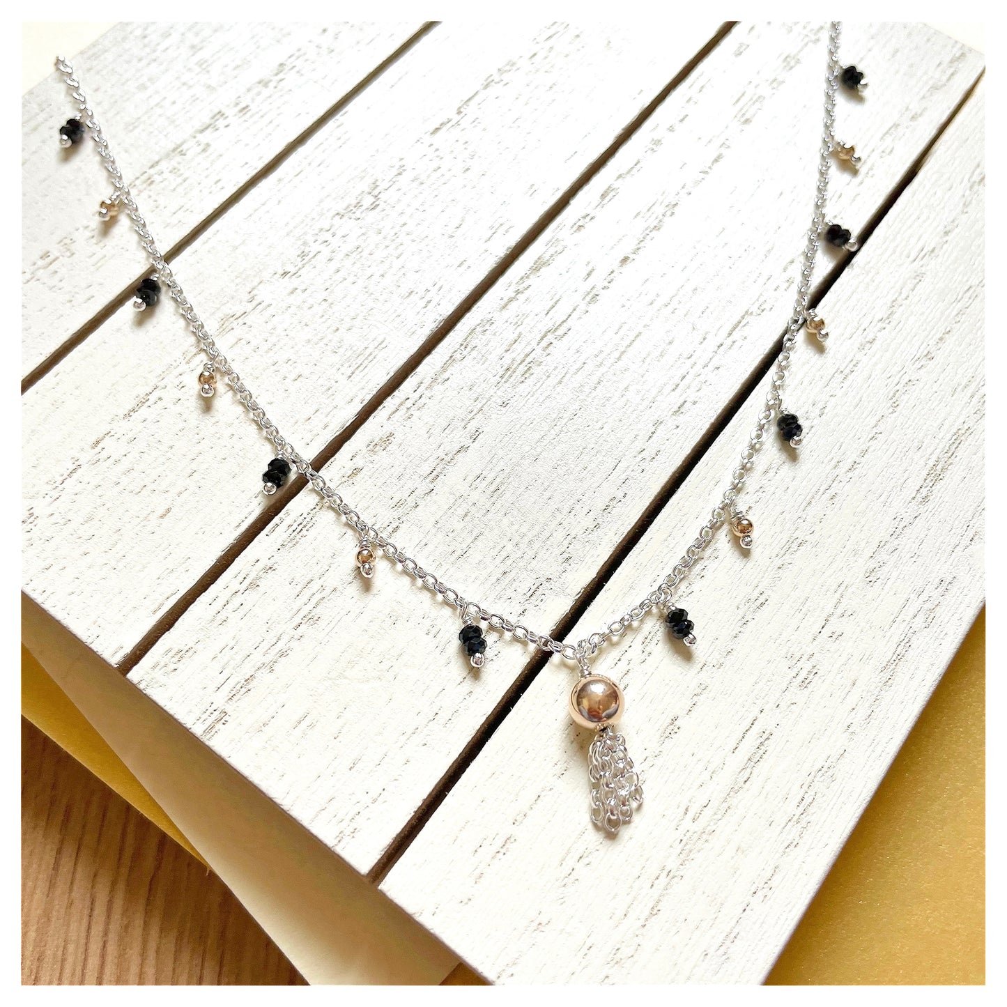 9ct Yellow Gold, Sterling Silver and Black Spinel Beaded Tassel Necklace.