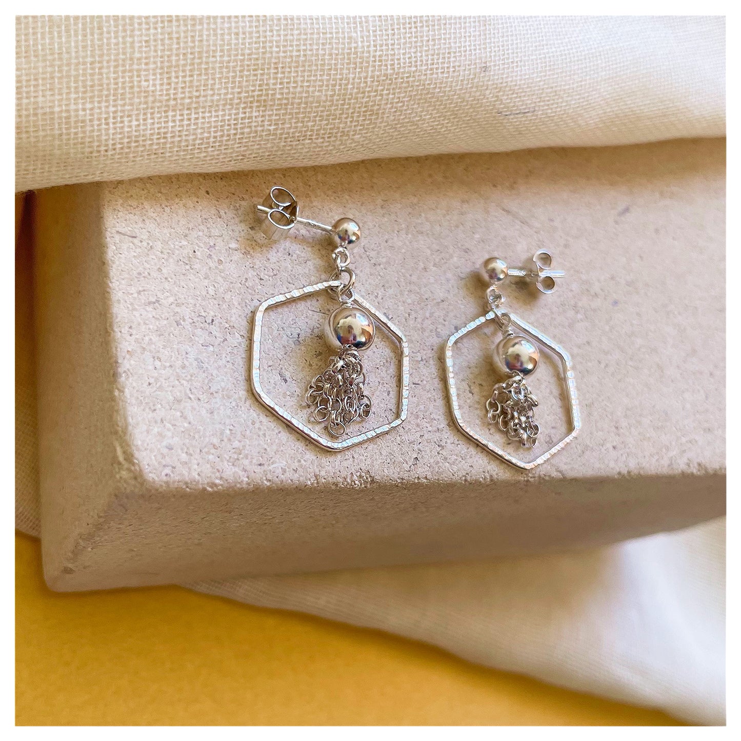 Sterling Silver Hammered Hexagon and Tassel Drop Stud earrings.