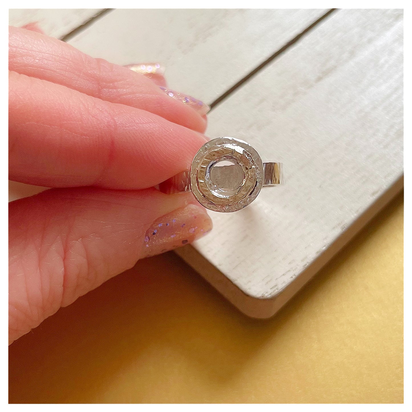Sterling Silver Hammered Donut Ring With a Hammered 9ct yellow Gold Halo