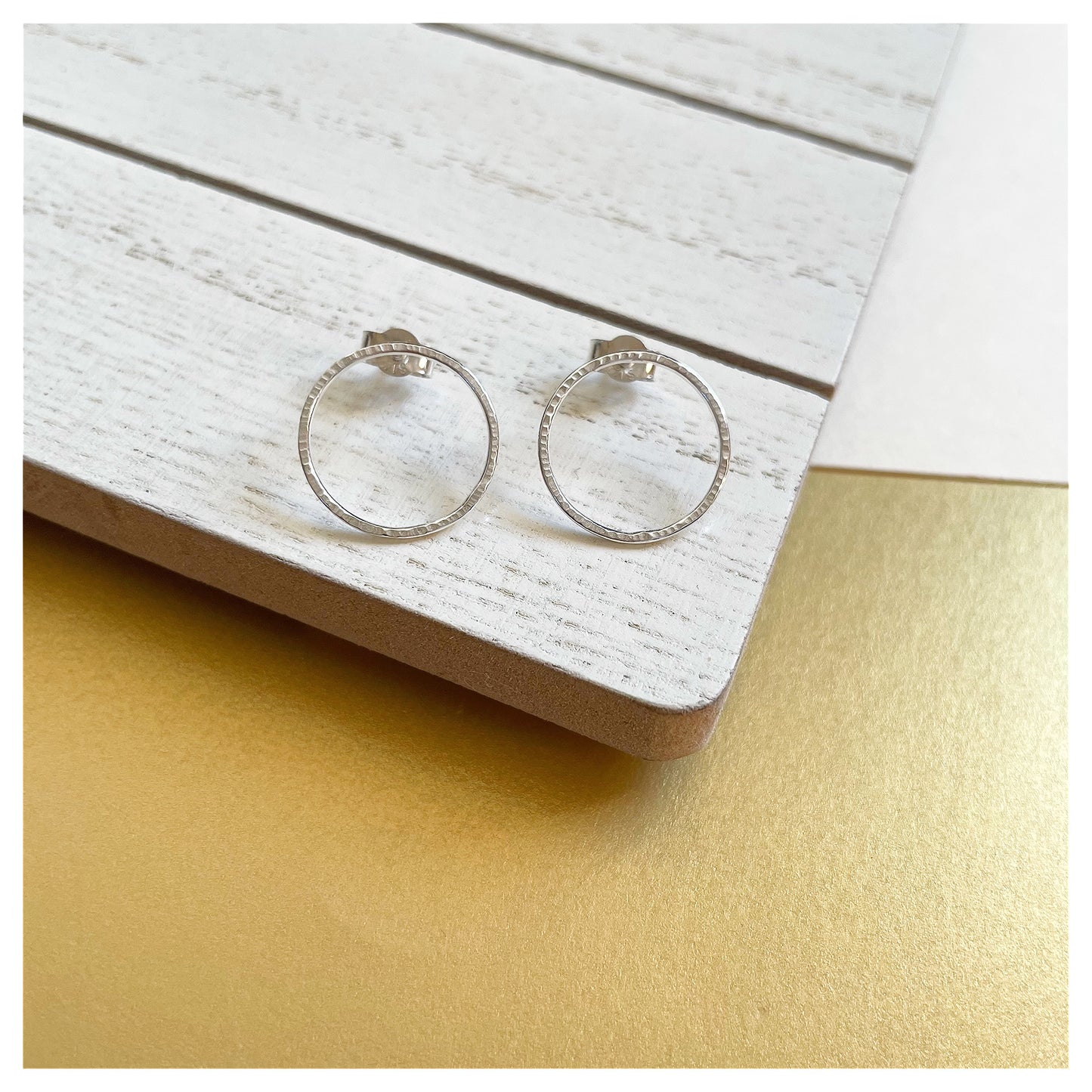 Small Sterling Silver Textured Circular Stud Earrings.