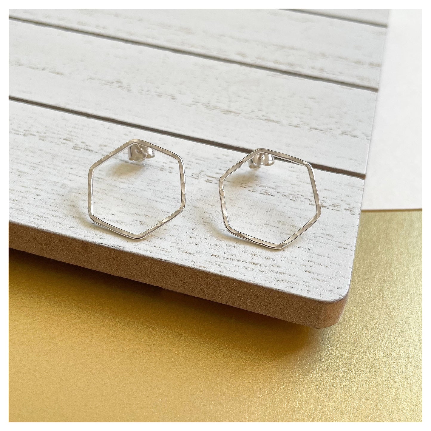 Medium Sterling Silver Hammered Hexagonal Stud Earrings.