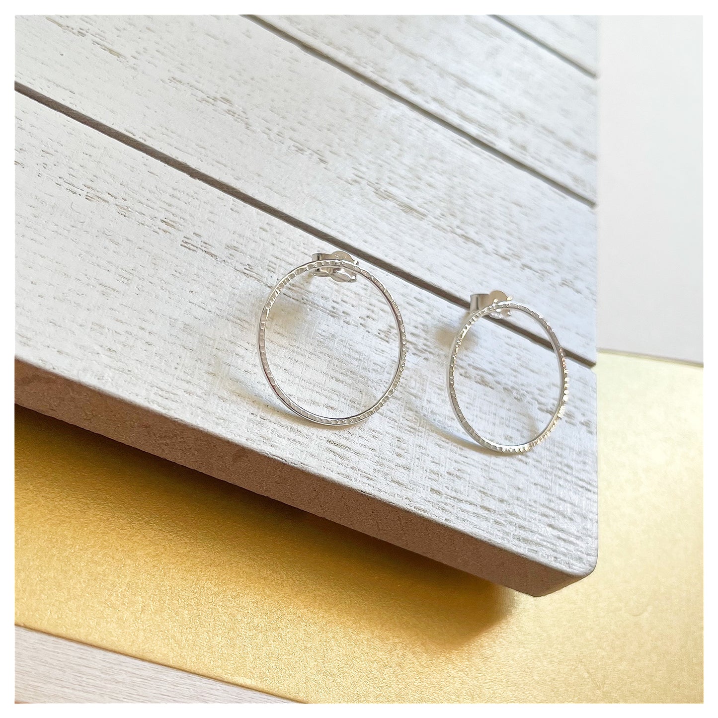 Medium Sterling Silver textured Circular Stud Earrings.