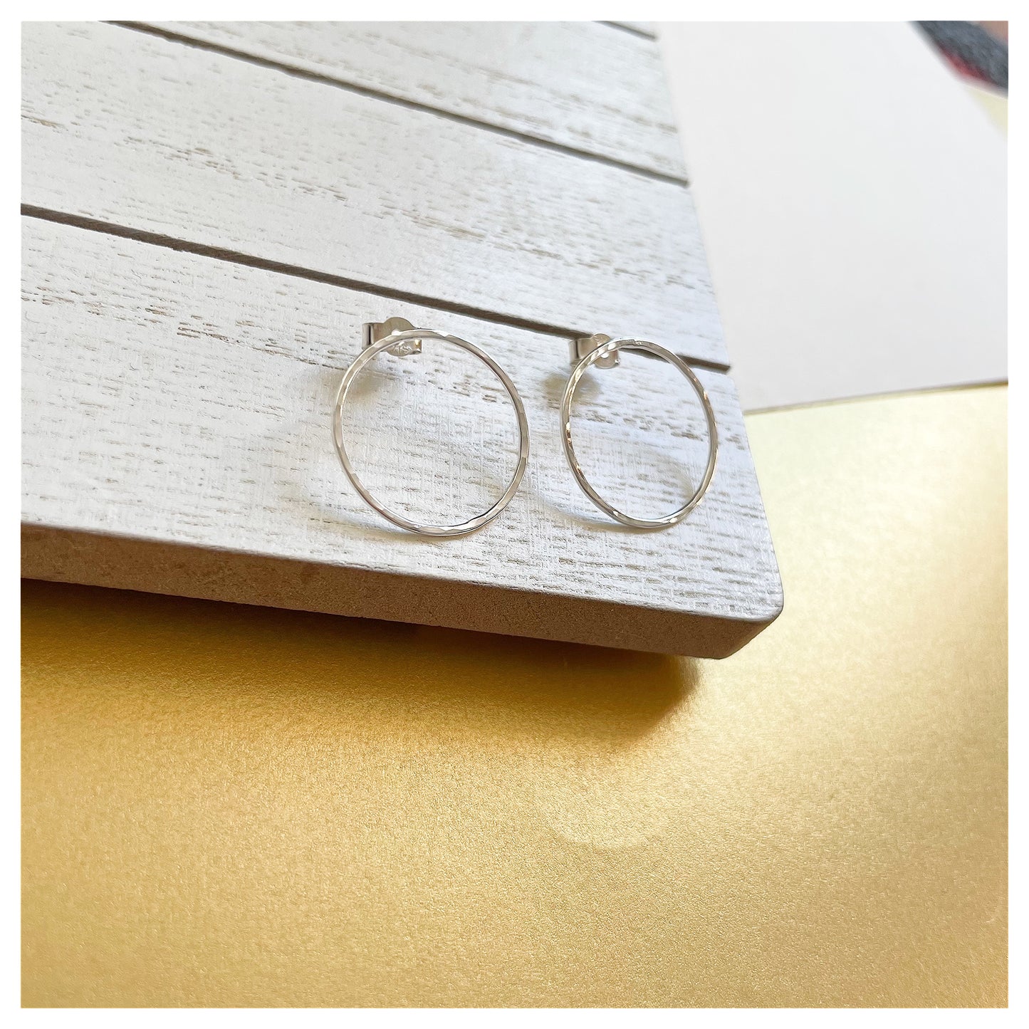 Medium Sterling Silver Hammered Circular Stud Earrings.