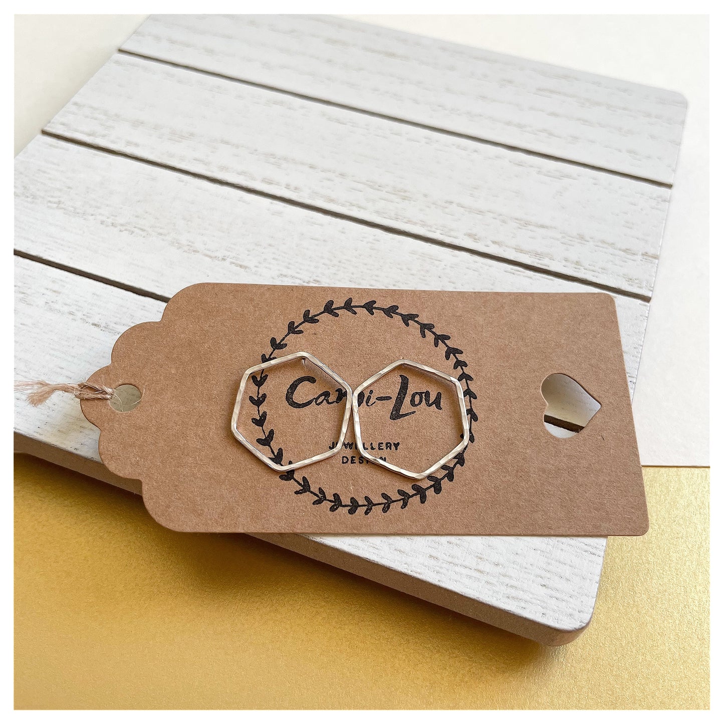 Medium Sterling Silver Hammered Hexagonal Stud Earrings.