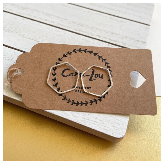 Medium Sterling Silver Hammered Hexagonal Stud Earrings.