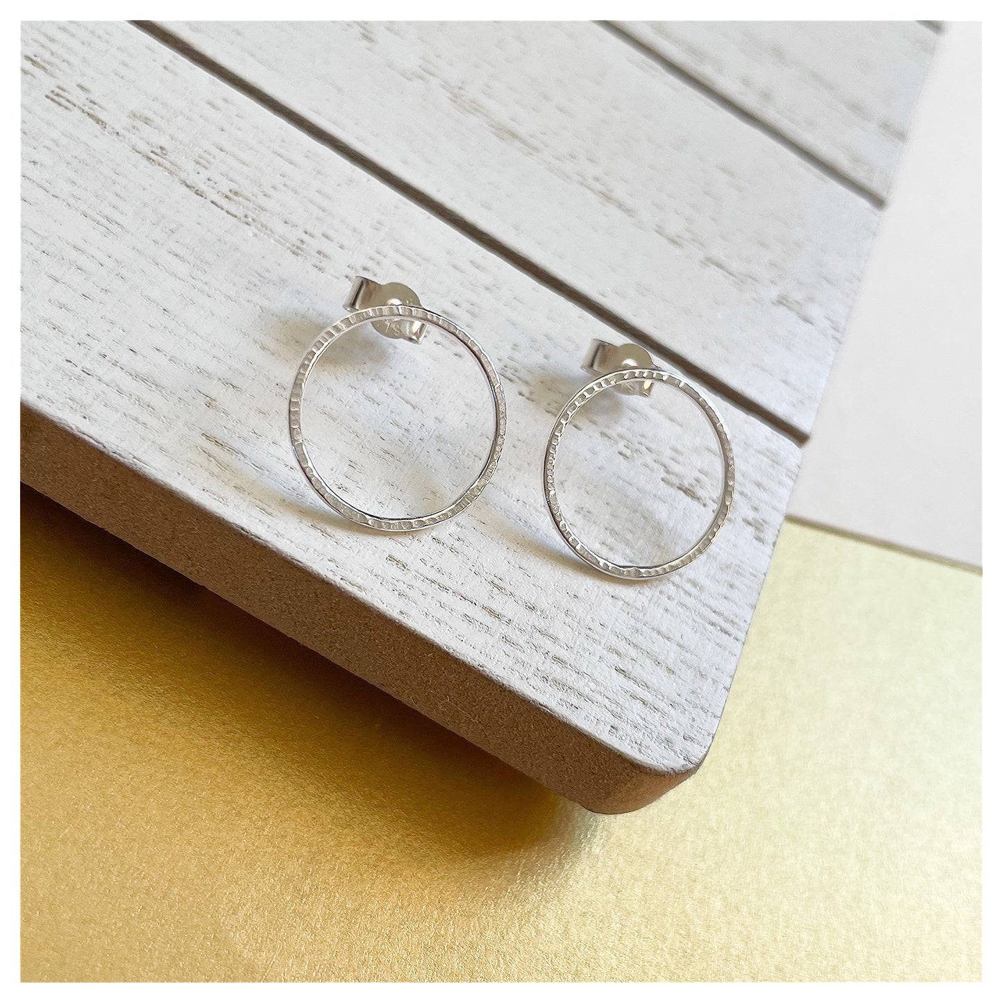 Small Sterling Silver Textured Circular Stud Earrings.