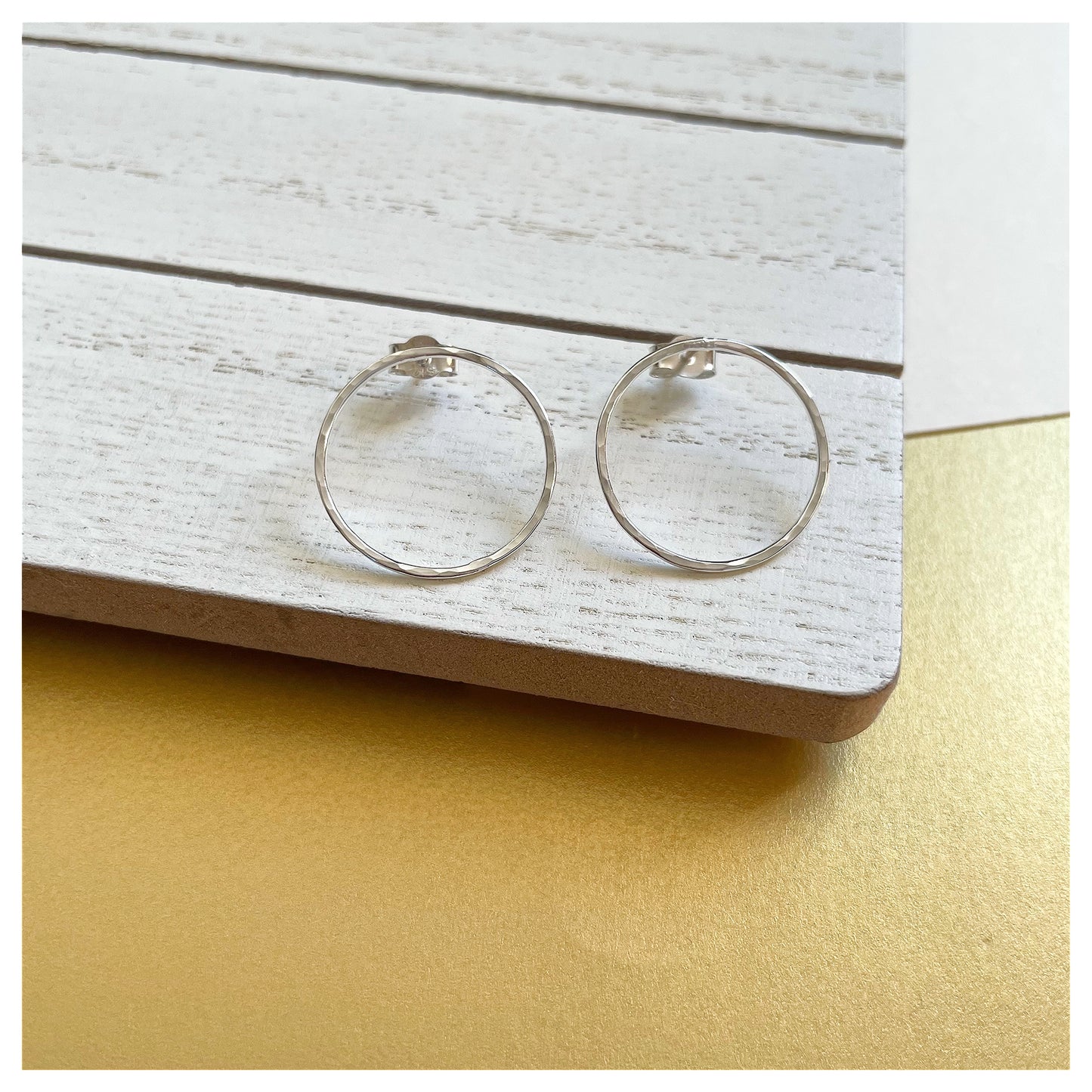 Medium Sterling Silver Hammered Circular Stud Earrings.