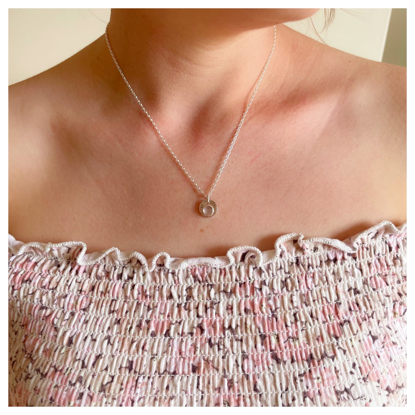 Sterling Silver and Rose Quartz Hammered Disc Pendant.