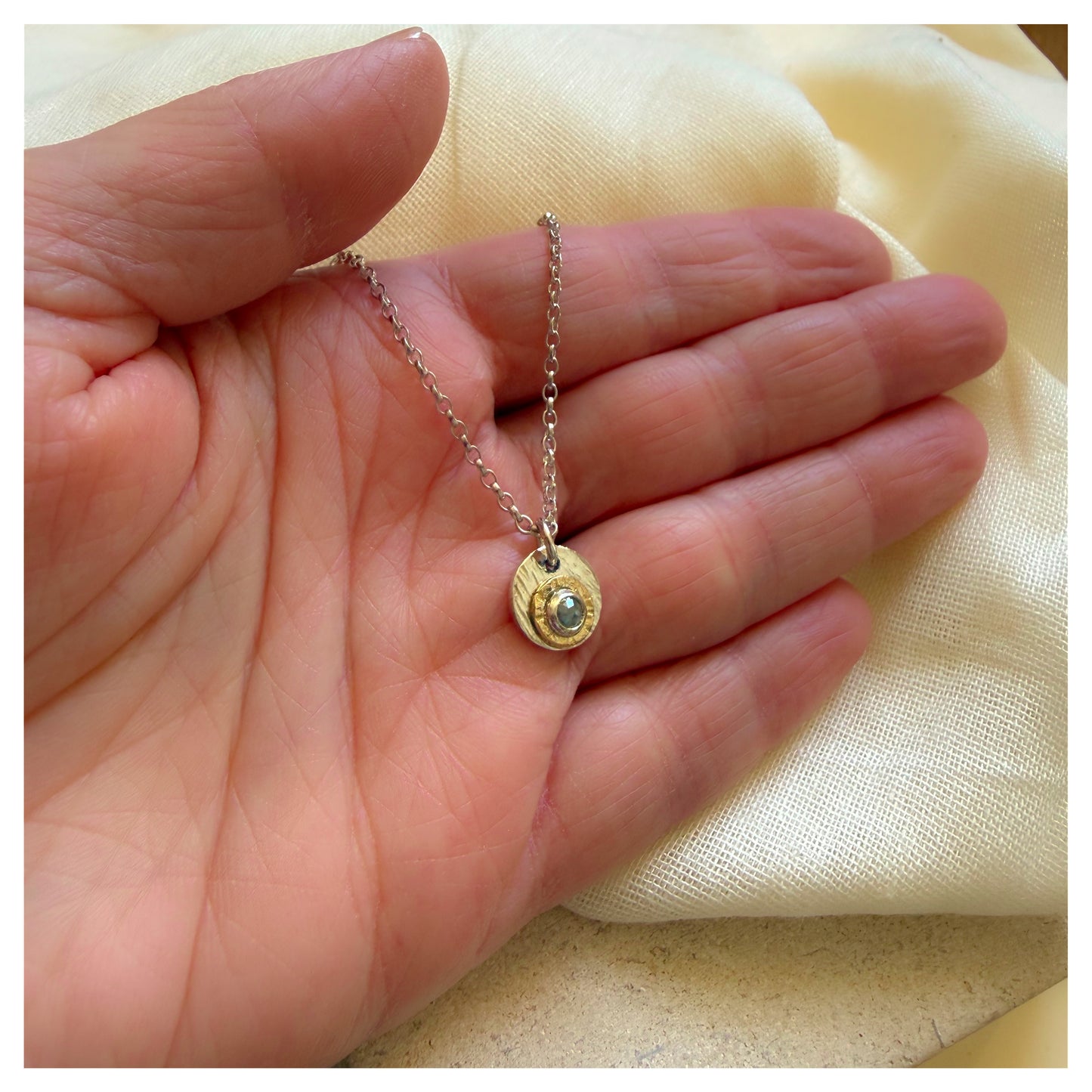 Sterling Silver, 9ct Yellow Gold Halo Rosecut Diamond Hammered Disc Pendant.
