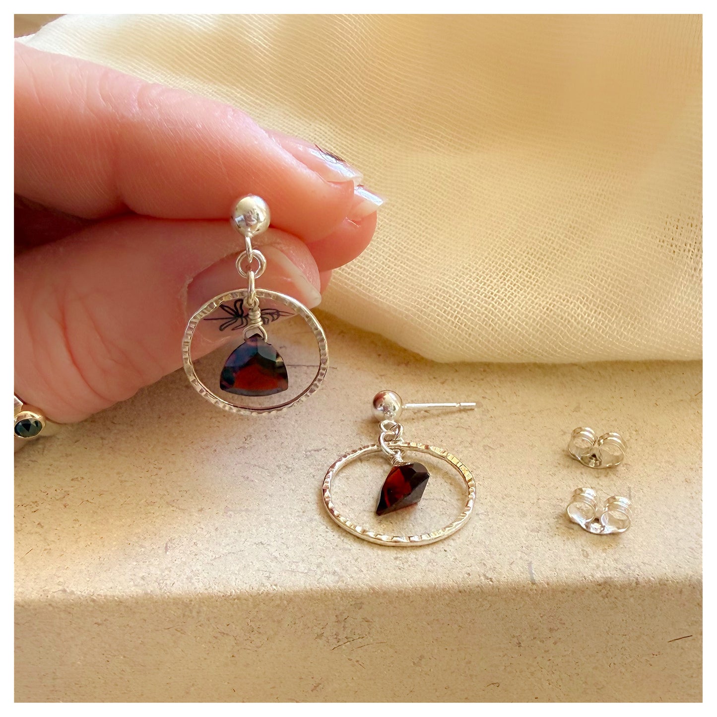 Sterling Silver Hammered Circle and Garnet Drop earrings.