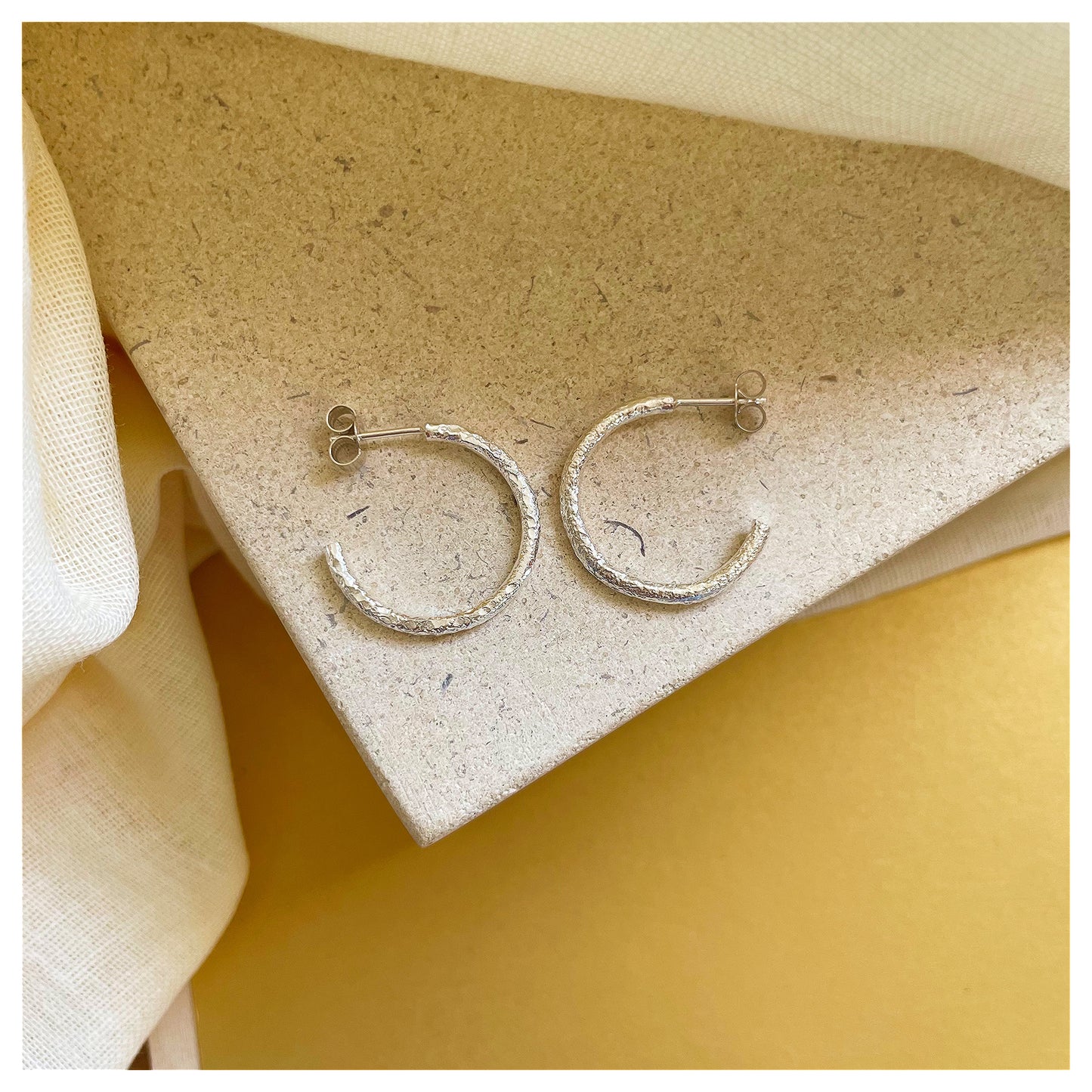 Sterling Silver Chunky Textured Hoop Earrings.