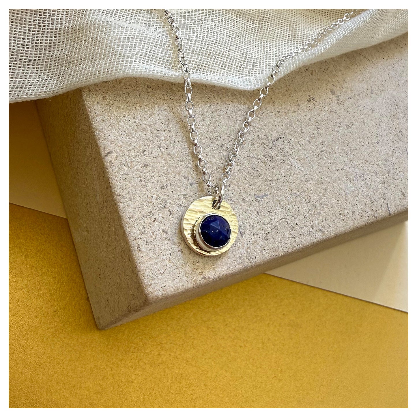 9ct Yellow Gold, Sterling Silver and Lapis Lazuli Hammered Disc Pendant.