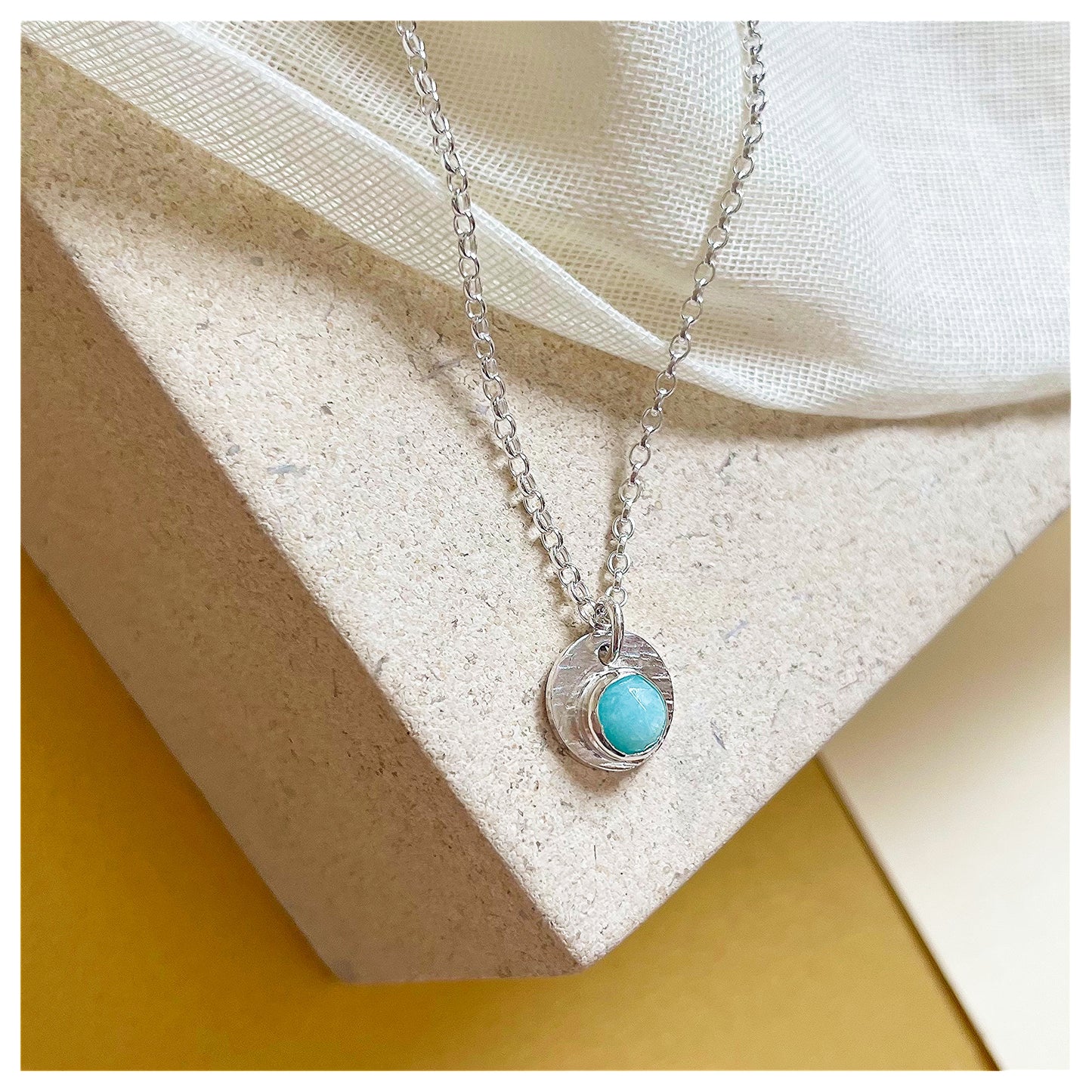 Sterling Silver and Amazonite Hammered Disc Pendant.