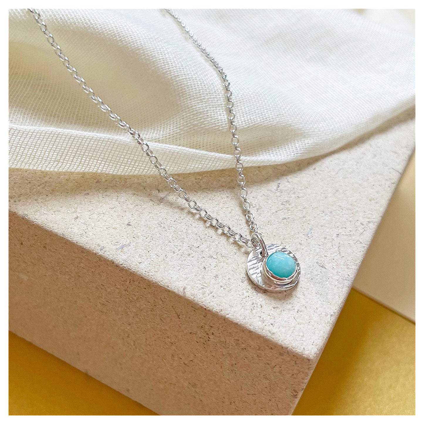 Sterling Silver and Amazonite Hammered Disc Pendant.