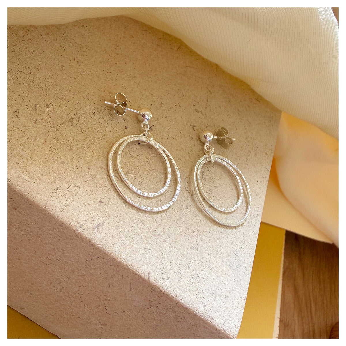 Sterling Silver Front Facing Double Circle drop Stud Earrings.
