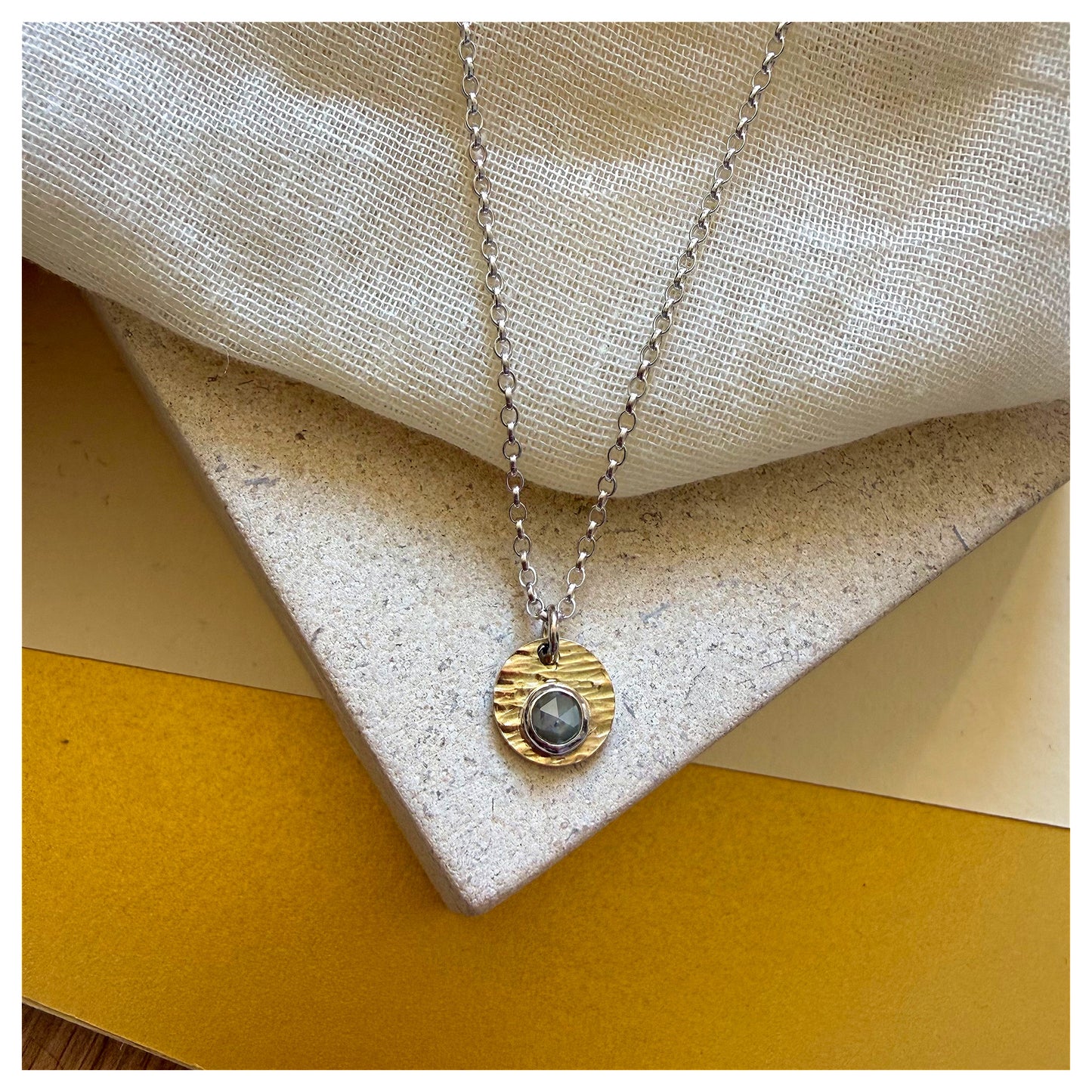 9ct Yellow Gold, Sterling Silver and Rosecut Diamond Hammered Disc Pendant.