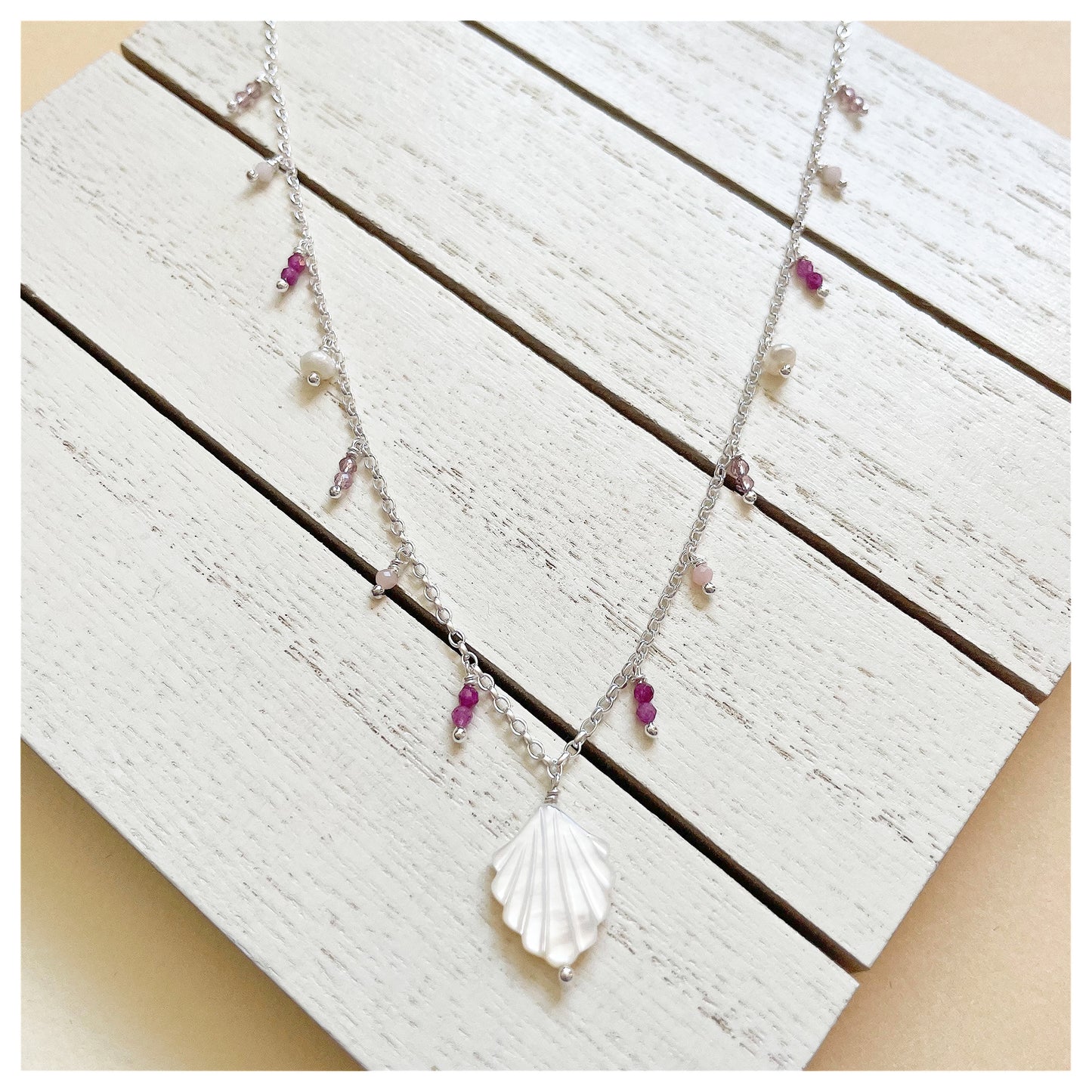 Sterling Silver, Mother of Pearl Shell and Gemstone Beaded Necklace. (4)