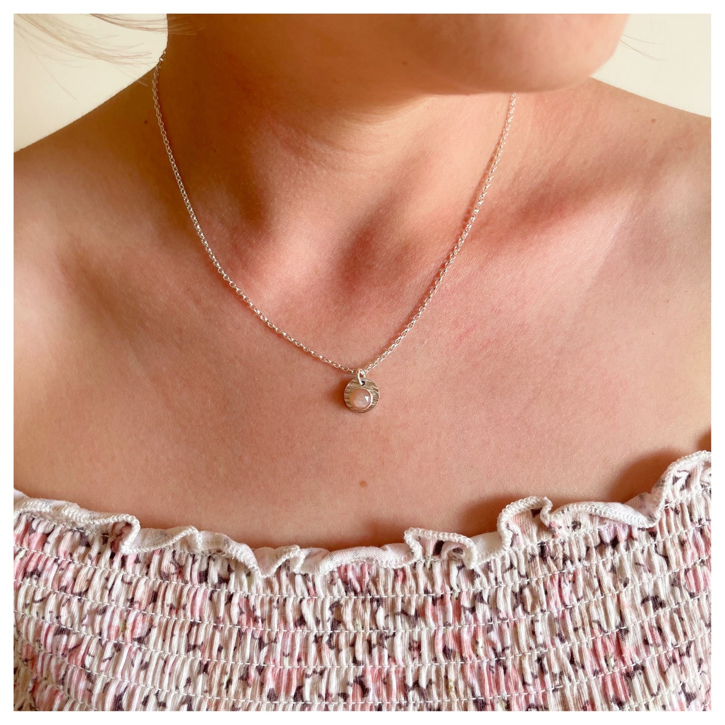 Sterling Silver and Peach Moonstone Hammered Disc Pendant.