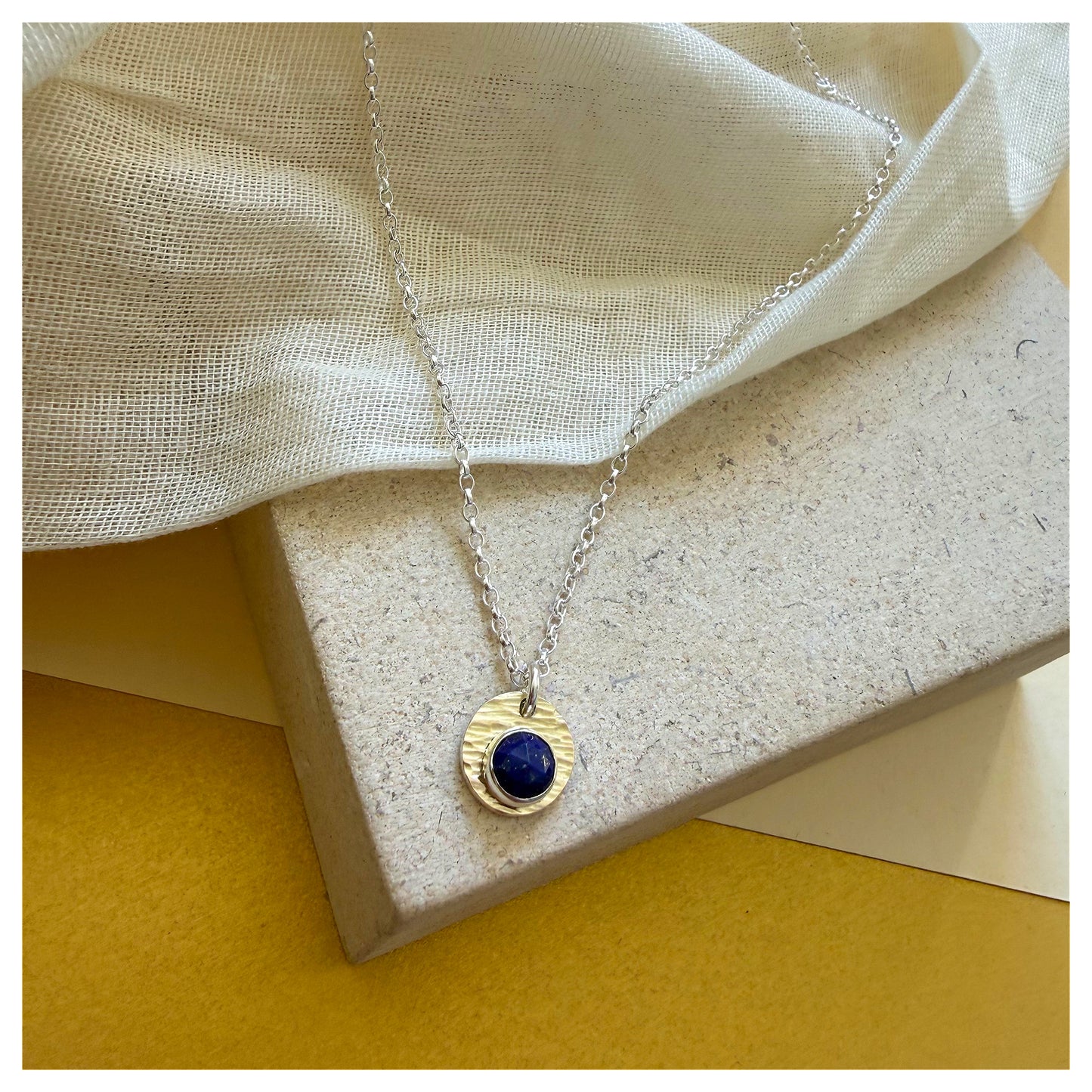 9ct Yellow Gold, Sterling Silver and Lapis Lazuli Hammered Disc Pendant.