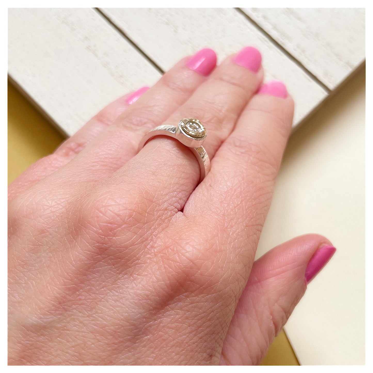 Sterling Silver Mini Hammered Donut Ring With 9ct Yellow Gold Halo.