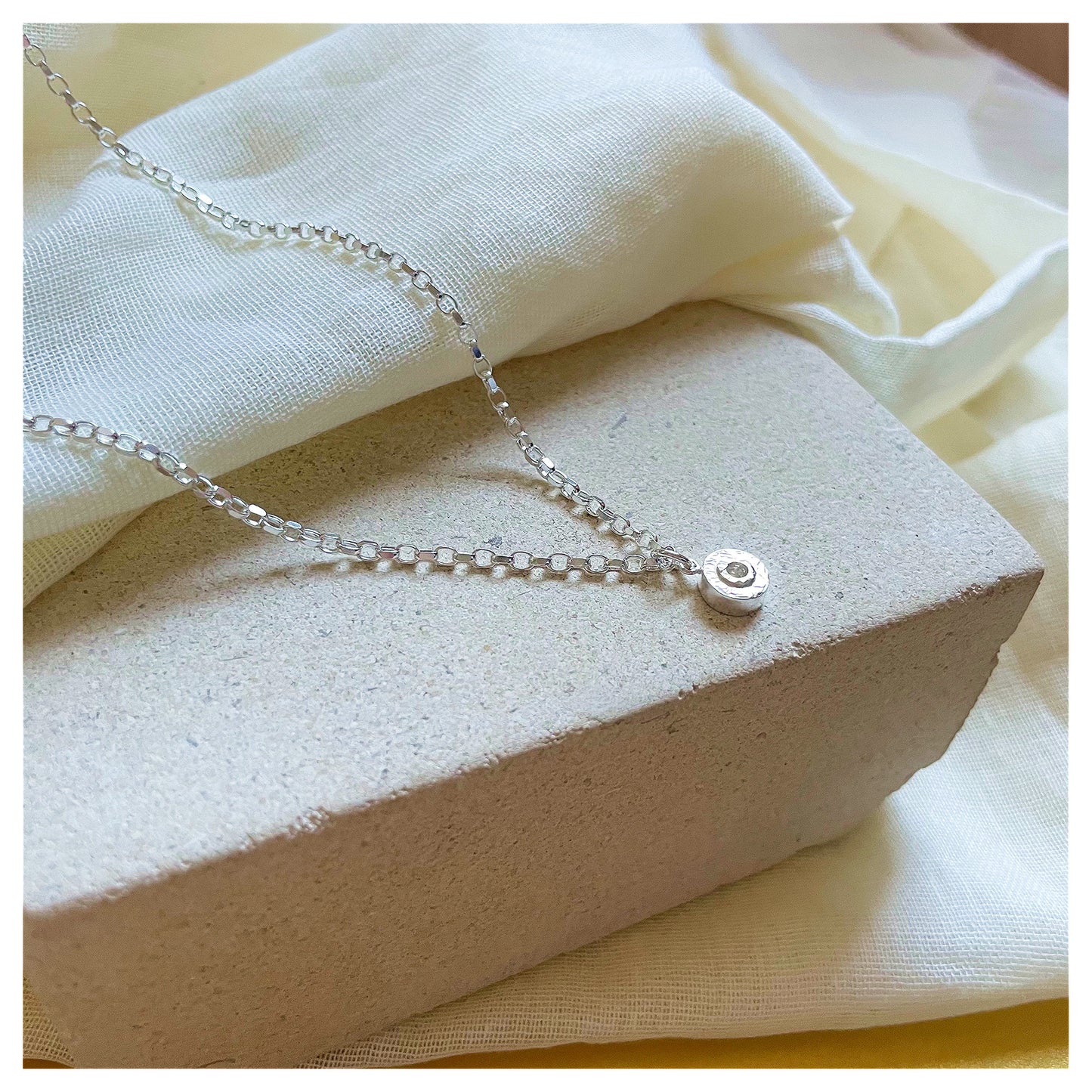 Sterling Silver and 9ct Yellow Gold Halo Textured Mini Donut Pendant.