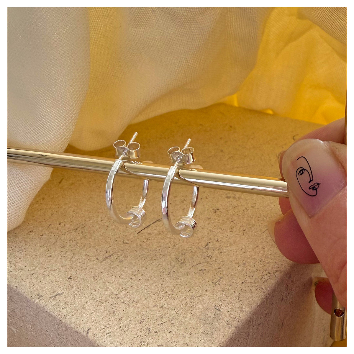 Sterling Silver 3/4 Hoop Earring With Triple Ring Detail.