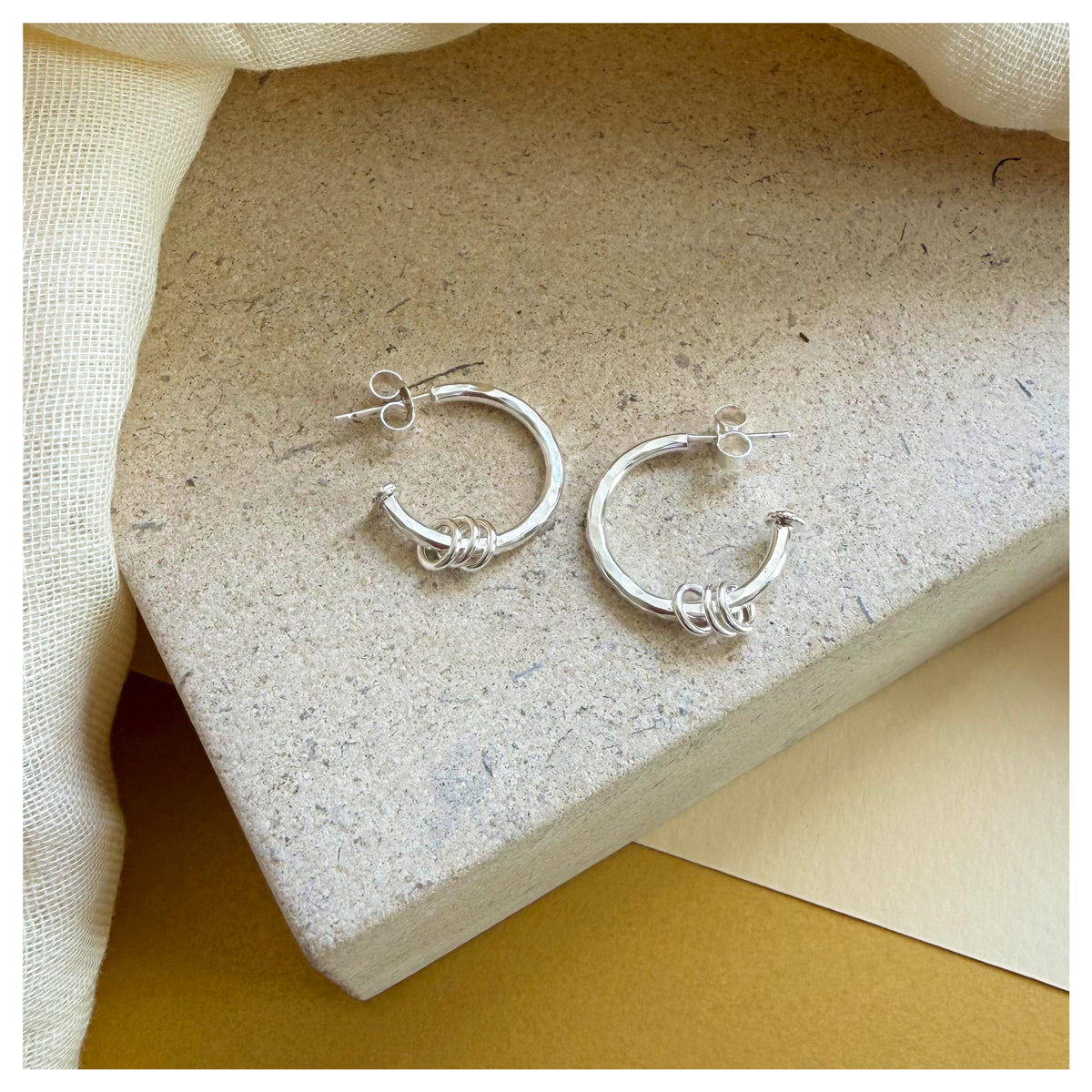 Sterling Silver 3/4 Hoop Earring With Triple Ring Detail.