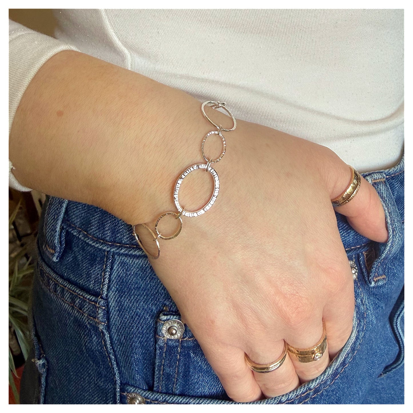 Sterling Silver Hammered Oval Link Chain Bracelet with large Hammered centre link .