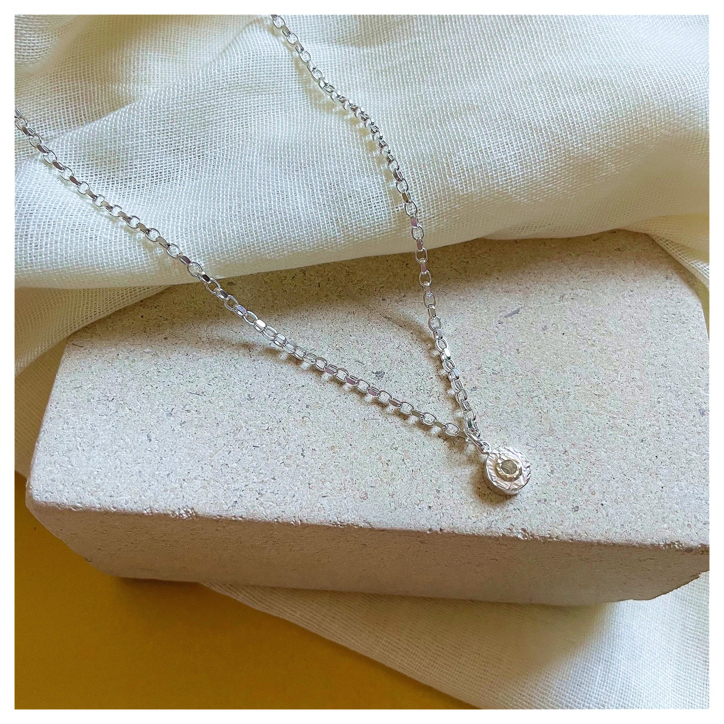 Sterling Silver and 9ct Yellow Gold Halo Textured Mini Donut Pendant.