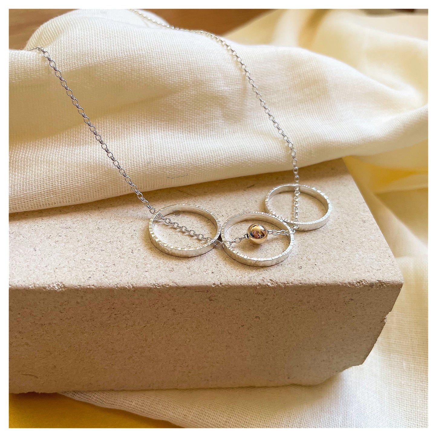 9ct Yellow Gold and Sterling Silver triple Circle Necklace with Bead.