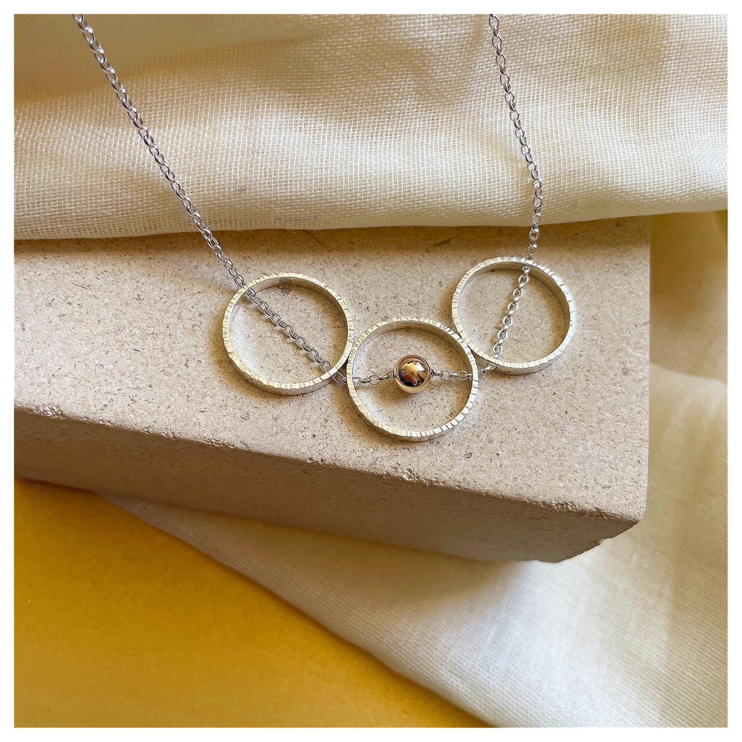 9ct Yellow Gold and Sterling Silver triple Circle Necklace with Bead.