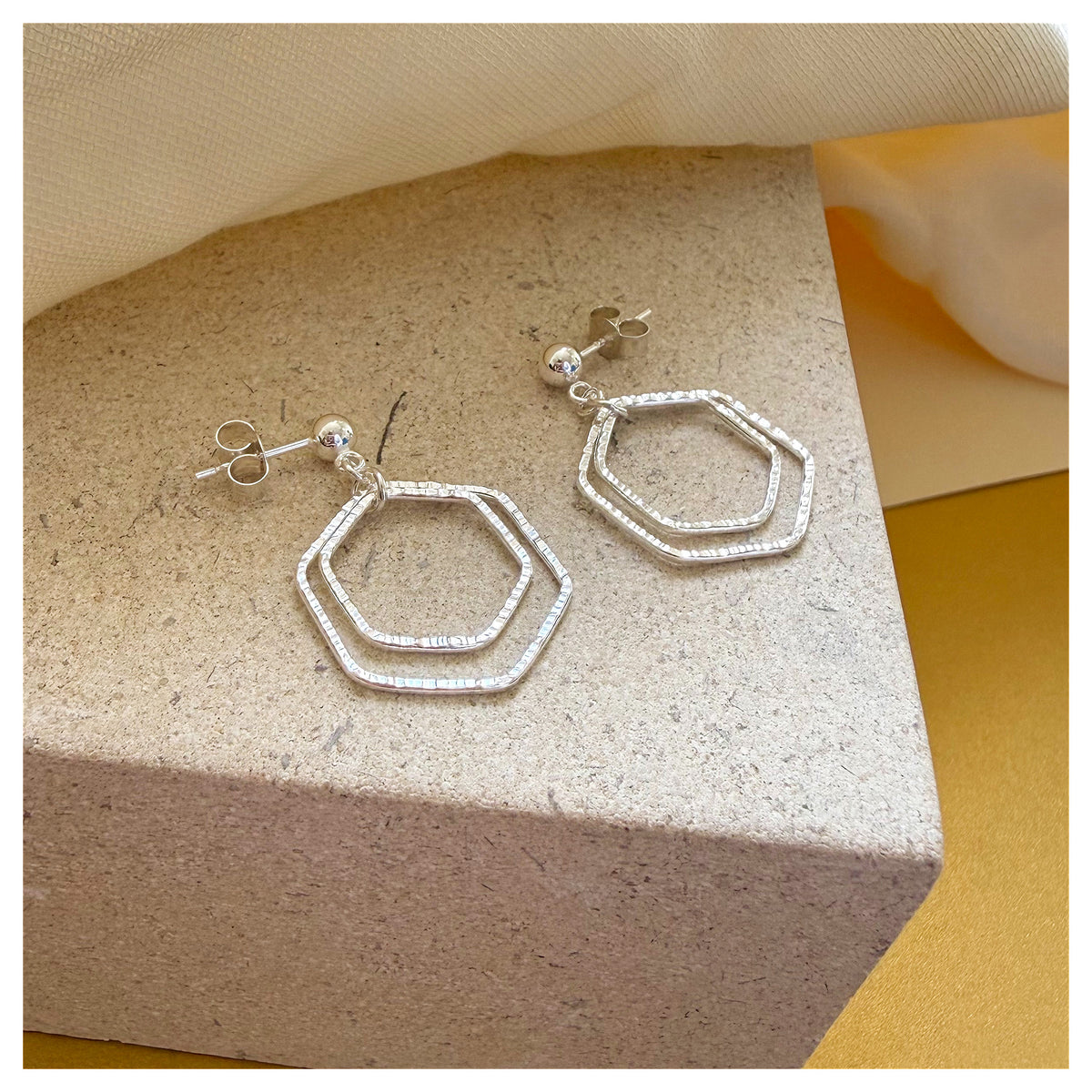 Sterling Silver Front Facing Double Hexagon drop Stud Earrings.