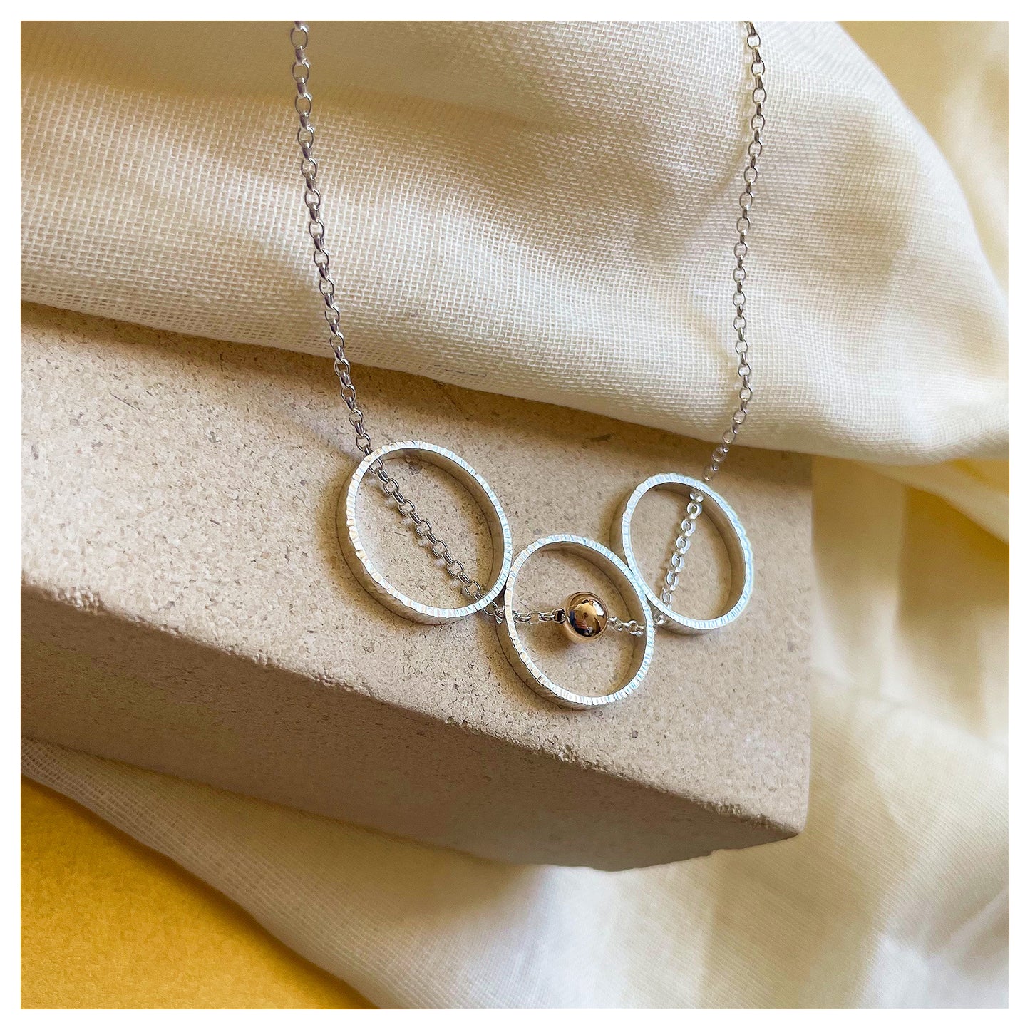 9ct Yellow Gold and Sterling Silver triple Circle Necklace with Bead.
