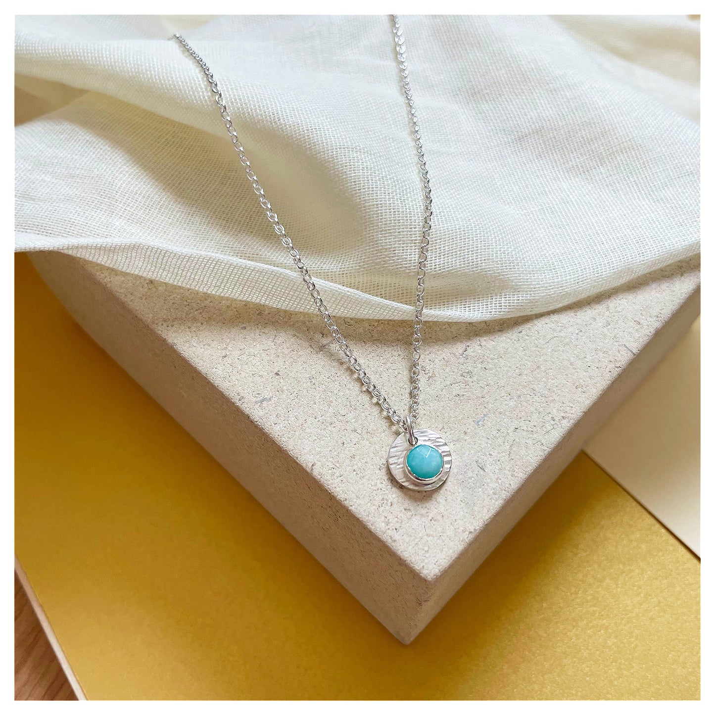 Sterling Silver and Amazonite Hammered Disc Pendant.