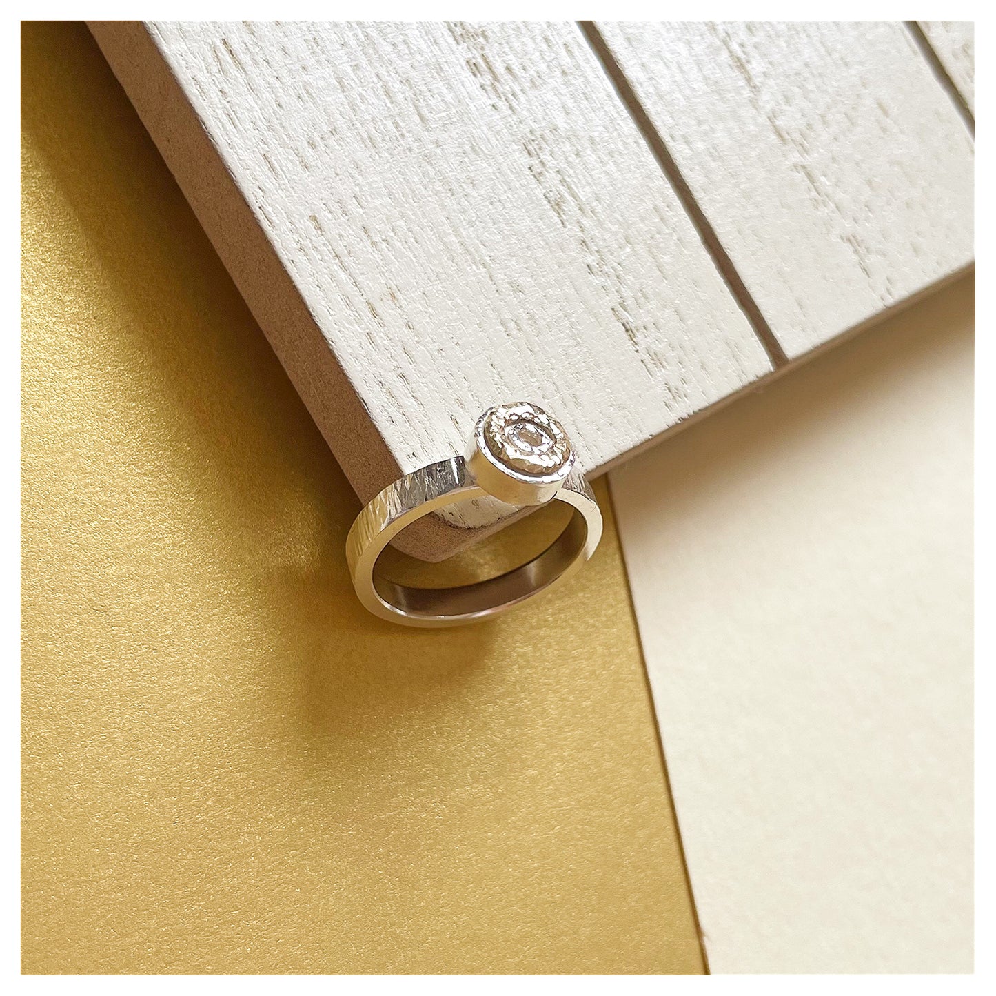 Sterling Silver Mini Hammered Donut Ring With 9ct Yellow Gold Halo.
