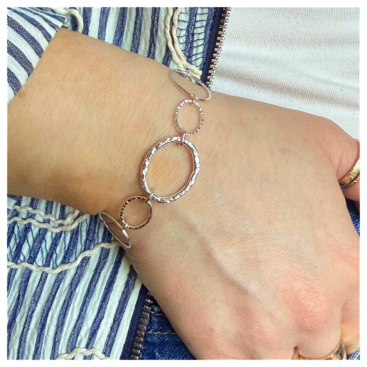 Sterling Silver Hammered Oval Link Chain Bracelet with large reticulated centre link .