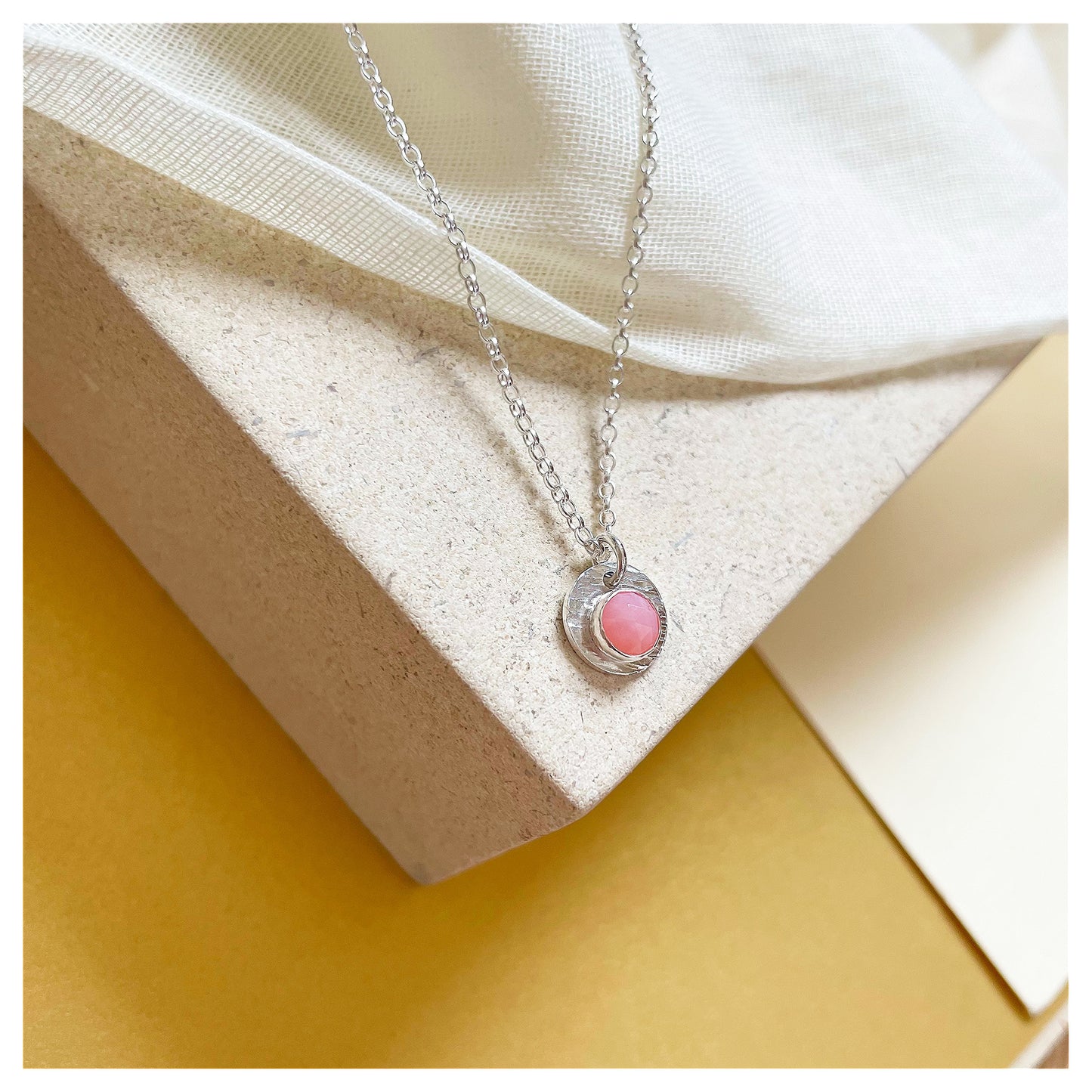 Sterling Silver and Pink Opal Hammered Disc Pendant.