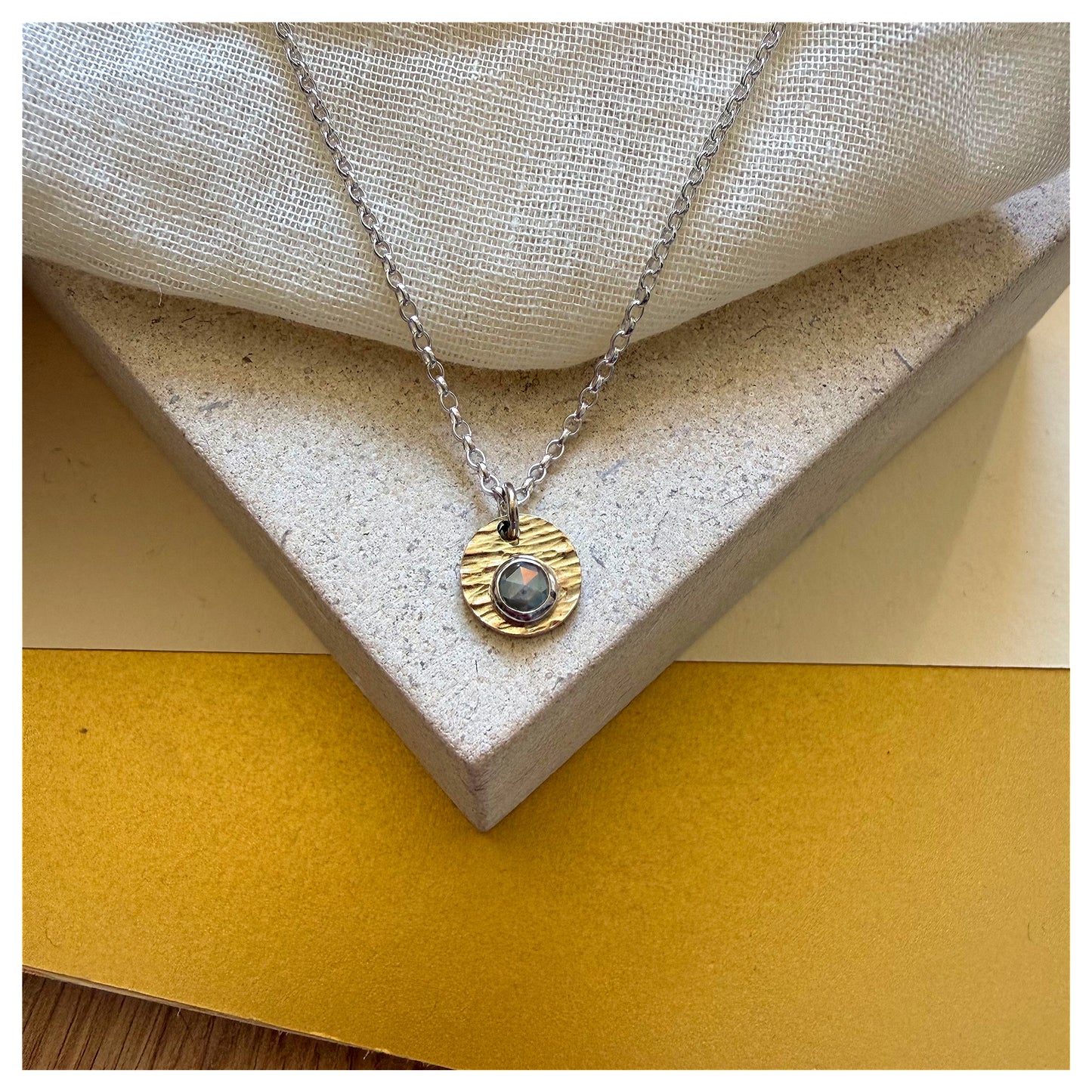 9ct Yellow Gold, Sterling Silver and Rosecut Diamond Hammered Disc Pendant.
