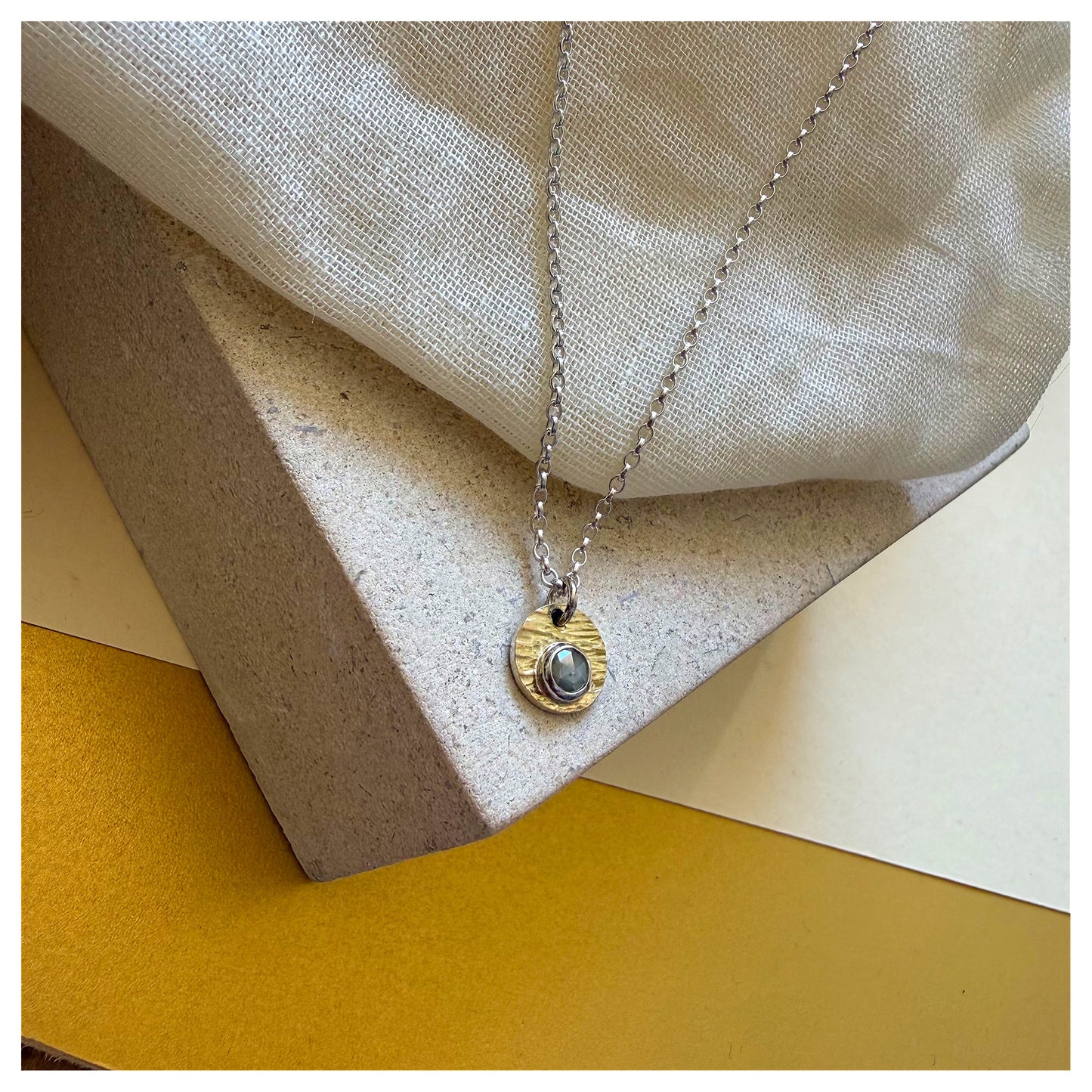 9ct Yellow Gold, Sterling Silver and Rosecut Diamond Hammered Disc Pendant.