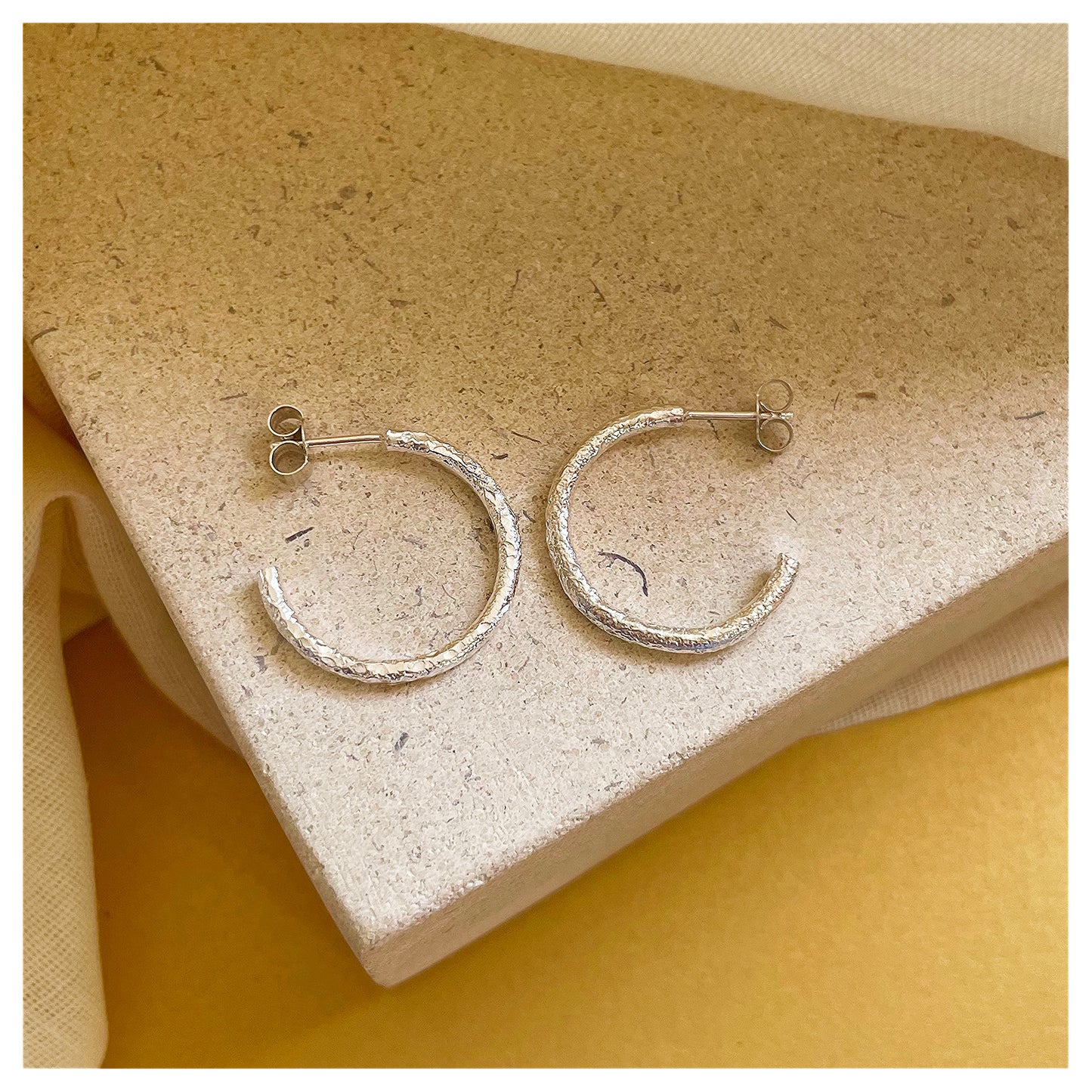 Sterling Silver Chunky Textured Hoop Earrings.