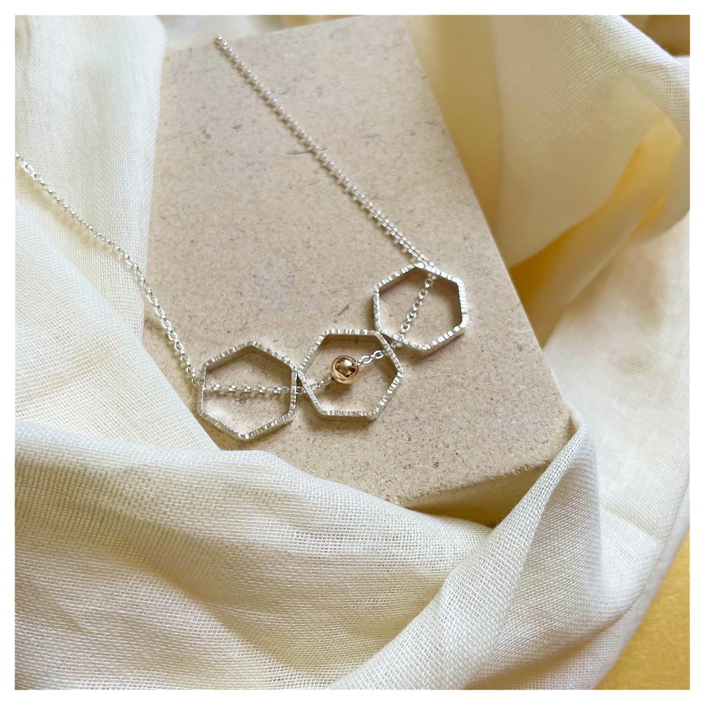 9ct Yellow Gold and Sterling Silver Triple Hexagon Necklace with Bead.