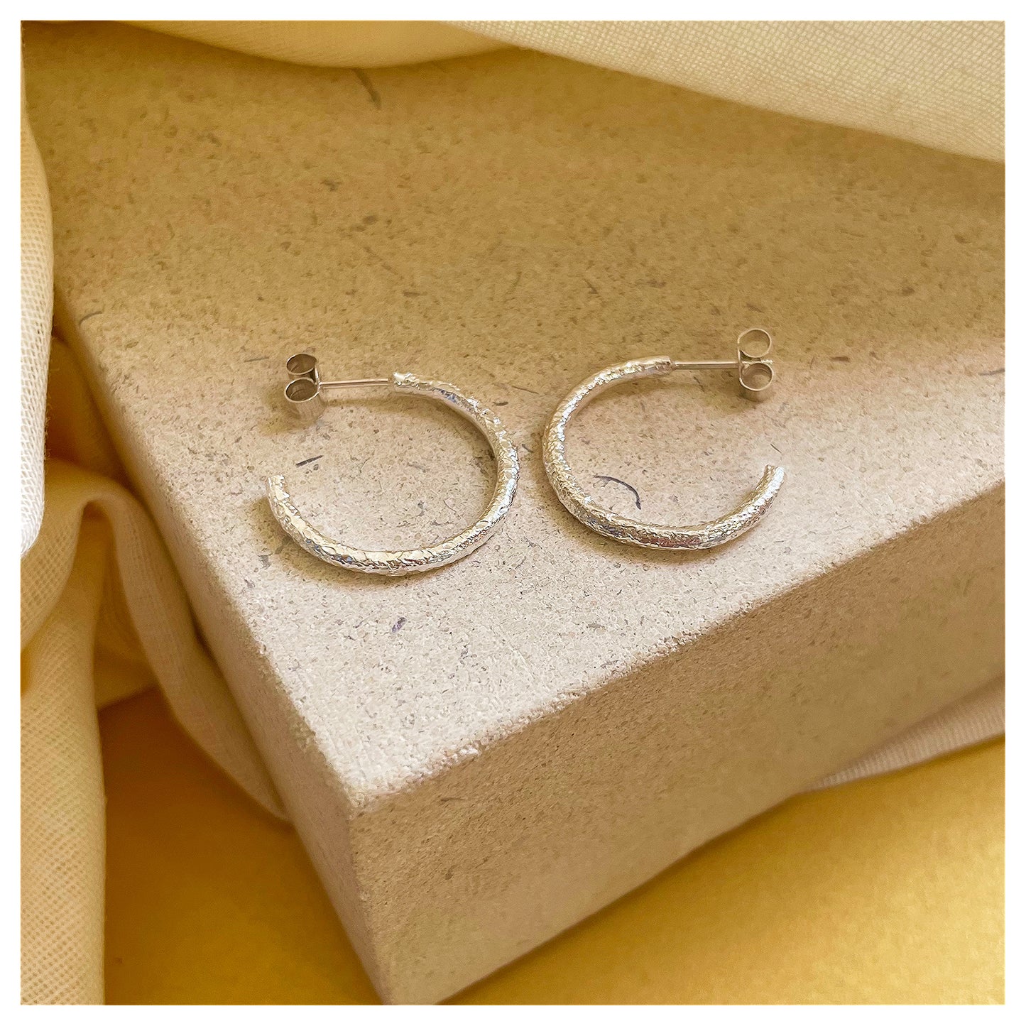 Sterling Silver Chunky Textured Hoop Earrings.