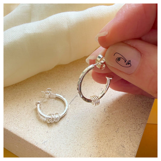 Sterling Silver 3/4 Hoop Earring With Triple Ring Detail.