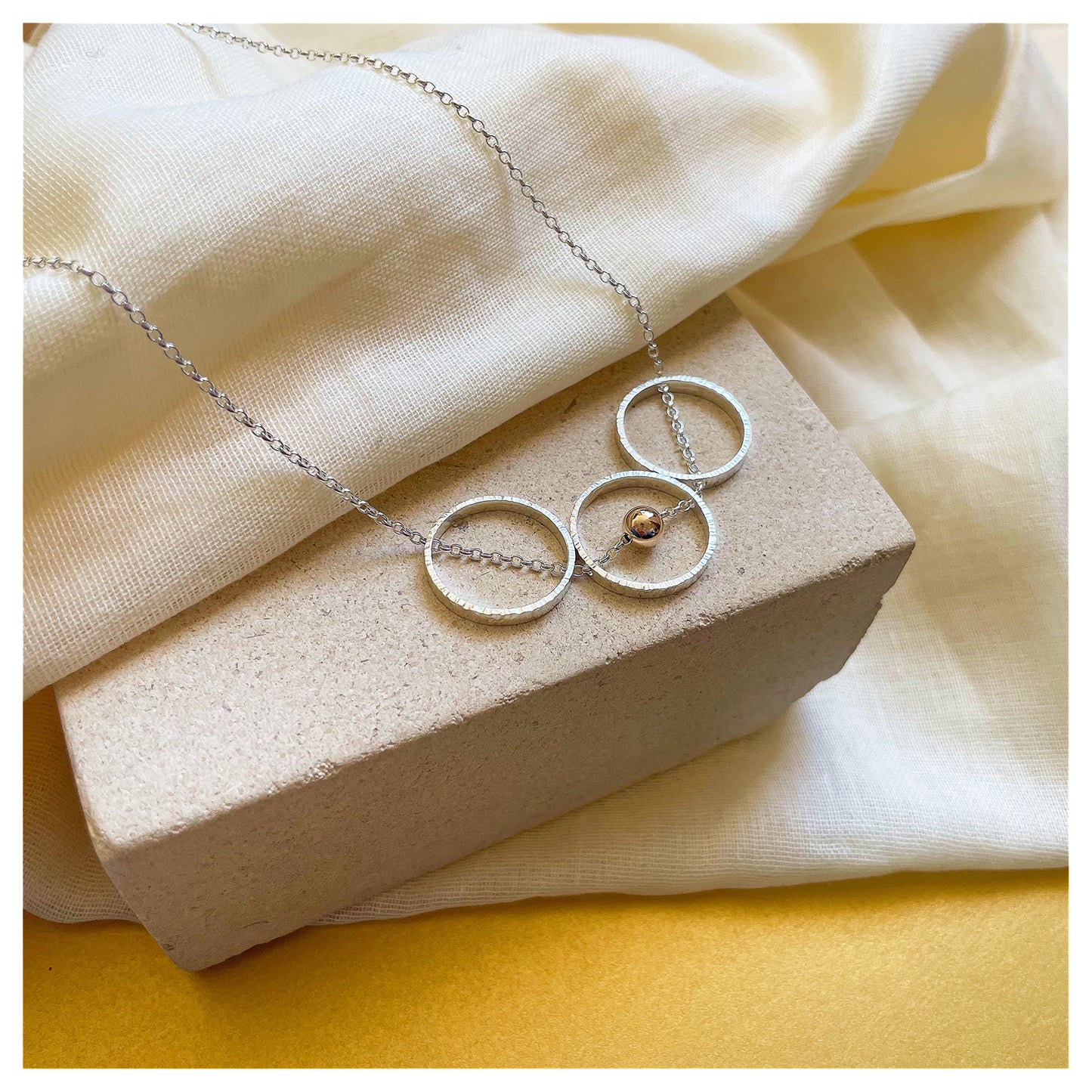 9ct Yellow Gold and Sterling Silver triple Circle Necklace with Bead.