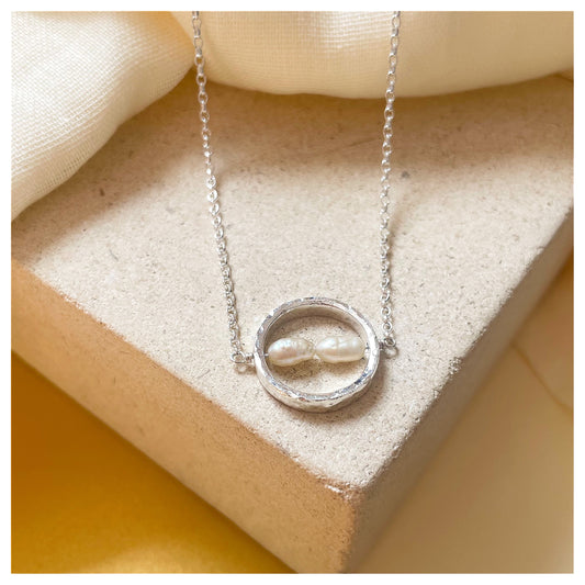 Sterling Silver Textured Circle Bar Pendant Necklace with Freshwater Rice Pearls.