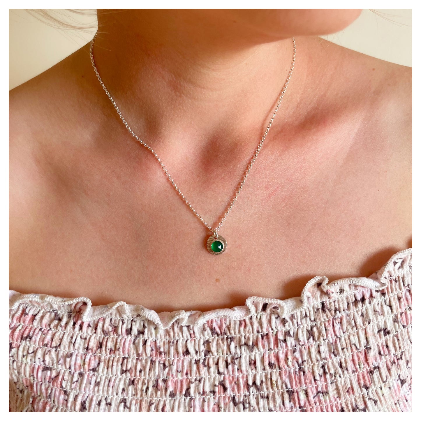 Sterling Silver and Green Onyx Hammered Disc Pendant.