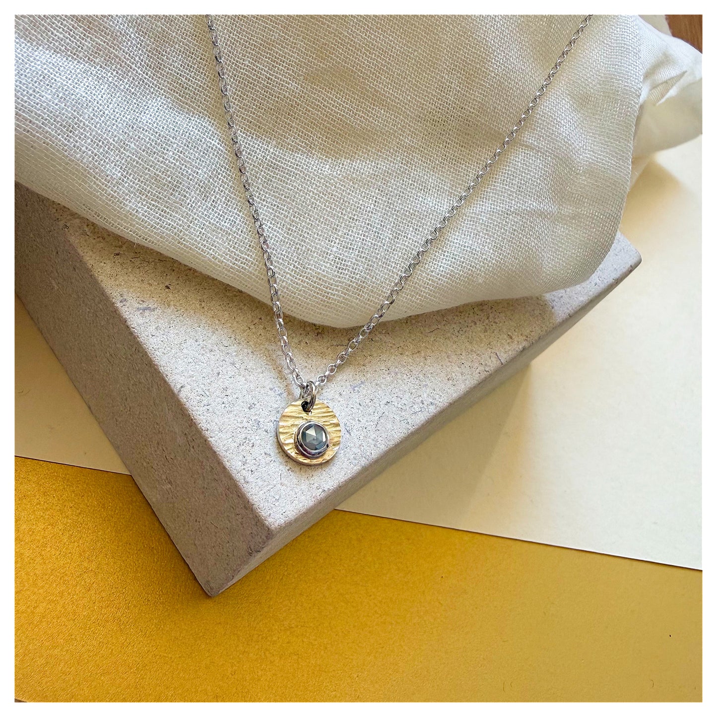 9ct Yellow Gold, Sterling Silver and Rosecut Diamond Hammered Disc Pendant.